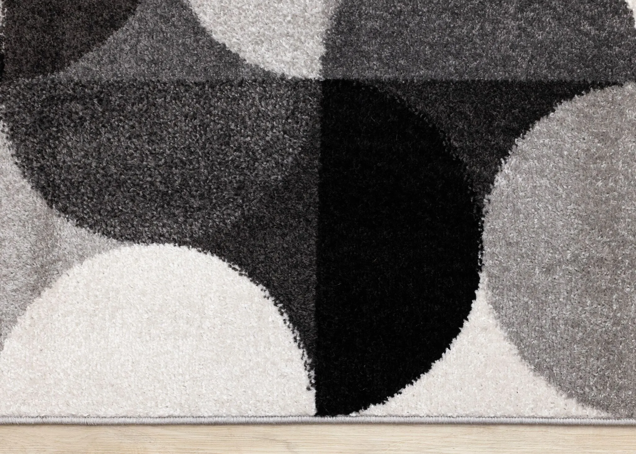 Eclipse 5'3" x 7'7" Mid-Century Modern Design Area Rug - Grey, Black, White