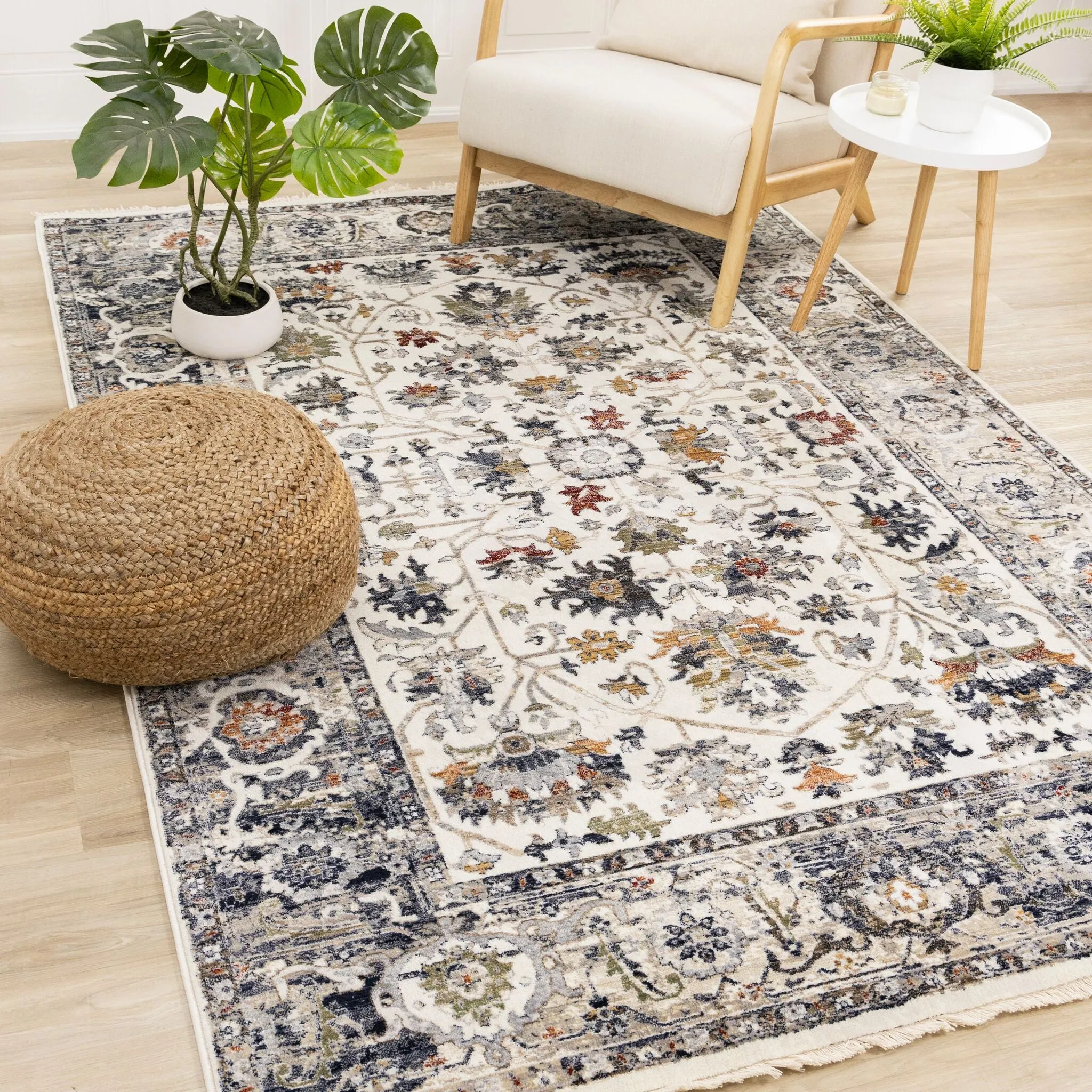 Serene 5'3" x 7'7" Intricate Border Area Rug